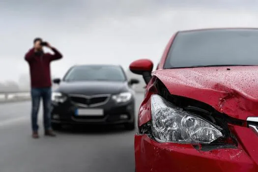 Car with front-end damage after a road collision